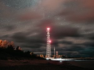 Preview wallpaper tower, night, starry sky, stars, glow