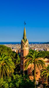 Preview wallpaper tower, palm trees, buildings, architecture, city