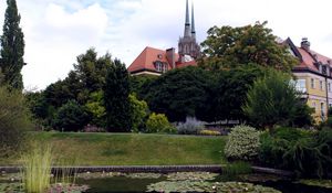 Preview wallpaper tower, peaks, pond, water-lilies, yard, garden