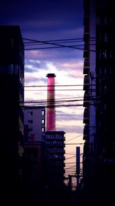 Preview wallpaper tower, pipe, buildings, wires, dark