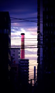 Preview wallpaper tower, pipe, buildings, wires, dark