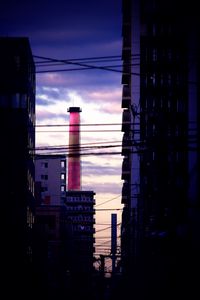 Preview wallpaper tower, pipe, buildings, wires, dark