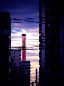 Preview wallpaper tower, pipe, buildings, wires, dark