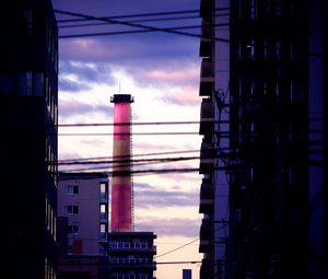 Preview wallpaper tower, pipe, buildings, wires, dark