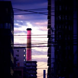 Preview wallpaper tower, pipe, buildings, wires, dark