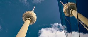 Preview wallpaper tower, skyscraper, architecture, mirror, sky, clouds, bottom view