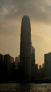 Preview wallpaper tower, skyscraper, buildings, sea, city, dark