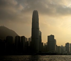 Preview wallpaper tower, skyscraper, buildings, sea, city, dark