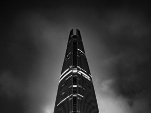 Preview wallpaper tower, skyscraper, lights, clouds, black and white