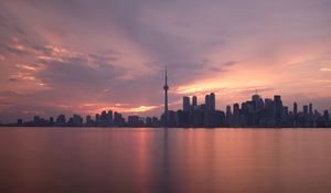 Preview wallpaper tower, skyscrapers, buildings, sea, city, twilight