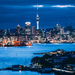 Preview wallpaper tower, skyscrapers, buildings, lights, sea, city