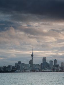Preview wallpaper tower, skyscrapers, buildings, city, sea, clouds