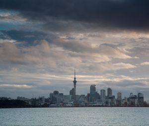 Preview wallpaper tower, skyscrapers, buildings, city, sea, clouds