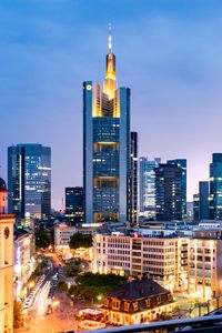 Preview wallpaper tower, skyscrapers, buildings, lights, city, twilight