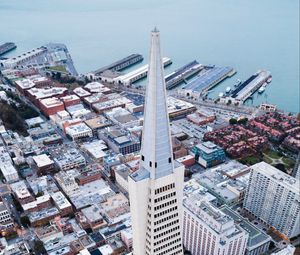 Preview wallpaper tower, skyscrapers, buildings, pier, sea