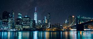 Preview wallpaper tower, skyscrapers, lights, night, river, starry sky