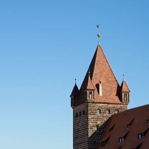 Preview wallpaper towers, building, architecture, bricks, sky