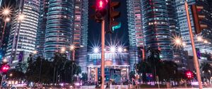 Preview wallpaper towers, buildings, architecture, city, night, traffic light
