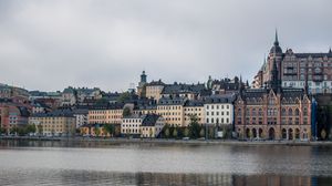 Preview wallpaper towers, buildings, architecture, river