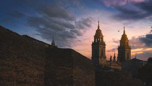 Preview wallpaper towers, buildings, architecture, evening
