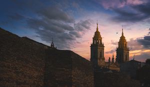 Preview wallpaper towers, buildings, architecture, evening