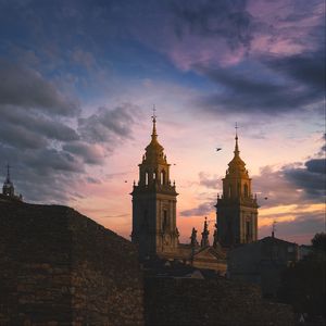 Preview wallpaper towers, buildings, architecture, evening