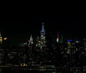 Preview wallpaper towers, buildings, lights, night, city