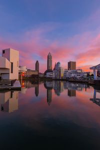 Preview wallpaper towers, buildings, reflection, lake, city