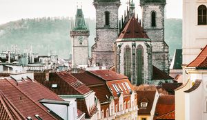 Preview wallpaper towers, buildings, roofs, architecture, street, city