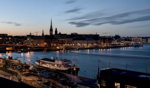 Preview wallpaper towers, buildings, ship, port, lights