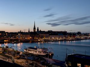 Preview wallpaper towers, buildings, ship, port, lights