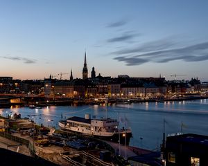 Preview wallpaper towers, buildings, ship, port, lights