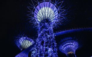 Preview wallpaper towers, glow, purple, plants