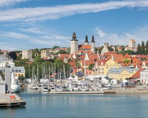 Preview wallpaper towers, houses, sea, bay, city, architecture