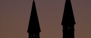 Preview wallpaper towers, silhouettes, evening, sunset, dark