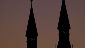 Preview wallpaper towers, silhouettes, evening, sunset, dark