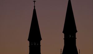Preview wallpaper towers, silhouettes, evening, sunset, dark