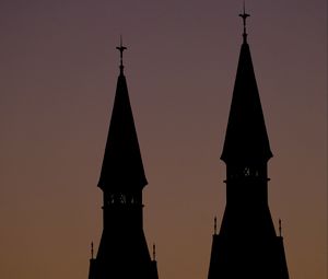 Preview wallpaper towers, silhouettes, evening, sunset, dark
