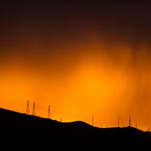 Preview wallpaper towers, silhouettes, horizon, twilight, dark