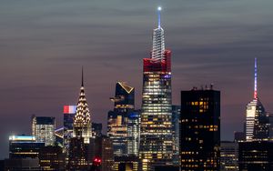 Preview wallpaper towers, skyscrapers, city, lights, night