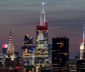 Preview wallpaper towers, skyscrapers, city, lights, night