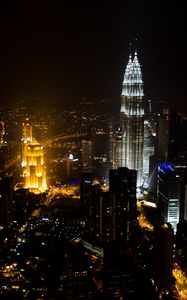 Preview wallpaper towers, skyscrapers, city, night, lights