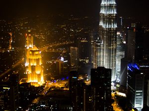 Preview wallpaper towers, skyscrapers, city, night, lights