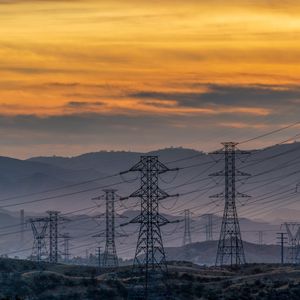 Preview wallpaper towers, wires, mountains, sky, sunset