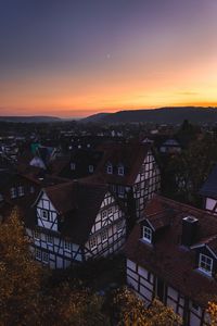 Preview wallpaper town, buildings, aerial view, architecture, sunset, twilight