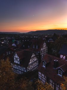 Preview wallpaper town, buildings, aerial view, architecture, sunset, twilight