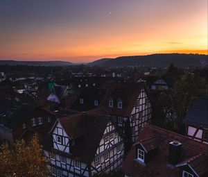 Preview wallpaper town, buildings, aerial view, architecture, sunset, twilight