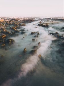 Preview wallpaper town, fog, aerial view, trees, hills