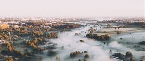 Preview wallpaper town, fog, aerial view, trees, hills