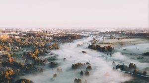 Preview wallpaper town, fog, aerial view, trees, hills